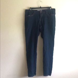 Plain dark-wash blue jeans